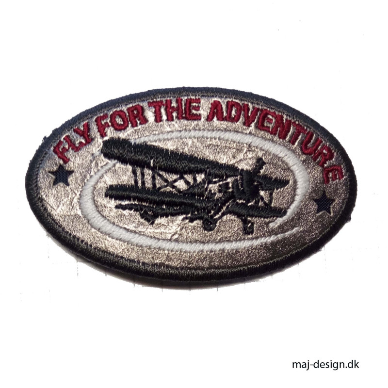 Broderet strygemærke Fly oval 6x3,5 cm