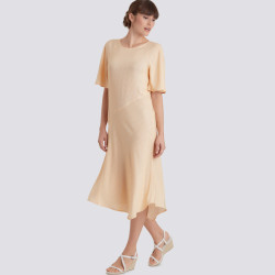 Kjole  også plusmode  snitmønster 9099 Simplicity