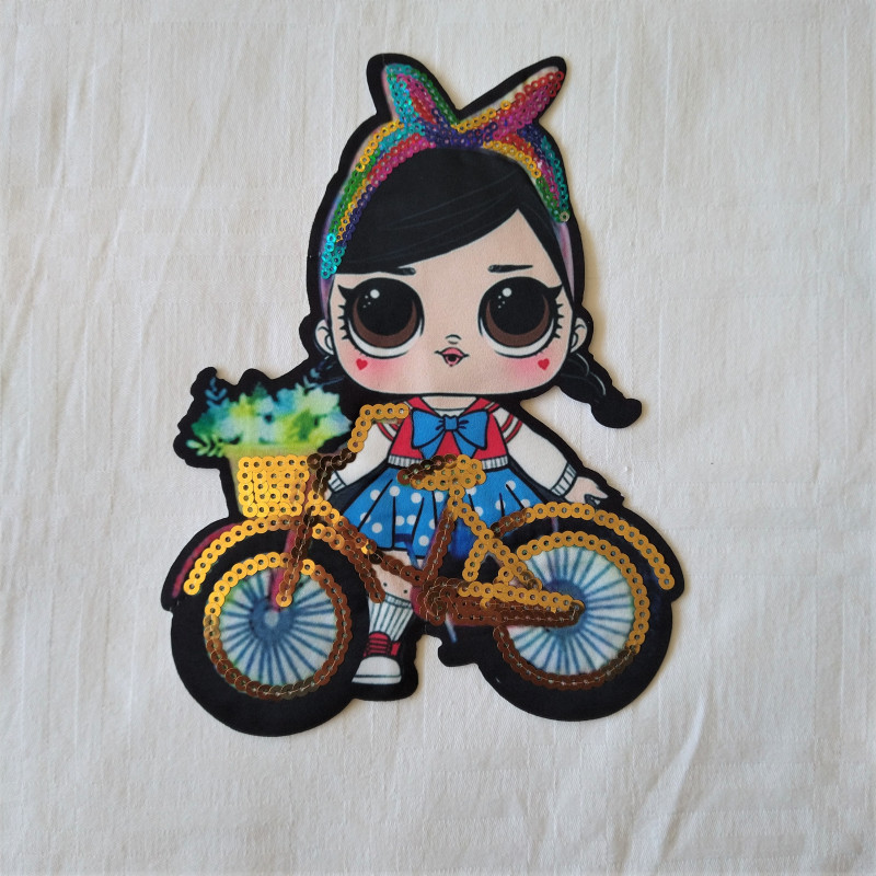 Pige m/guld cykel  Paillet  strygemærke