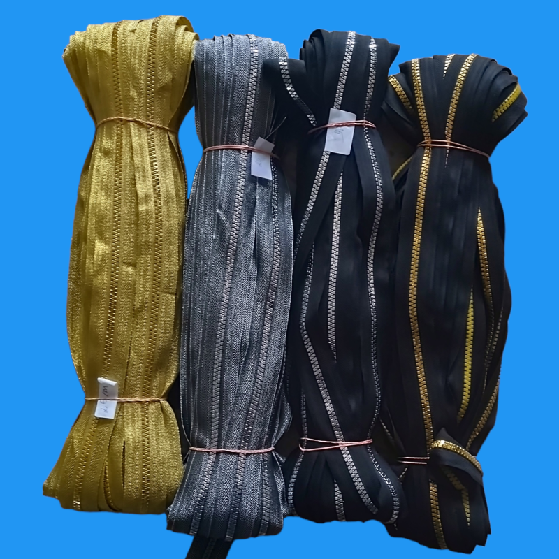 6mm delrin lynlås i metermål sølv og guld